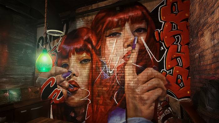 Nighttime portrait mural by Miami graffiti and mural artist DREPS